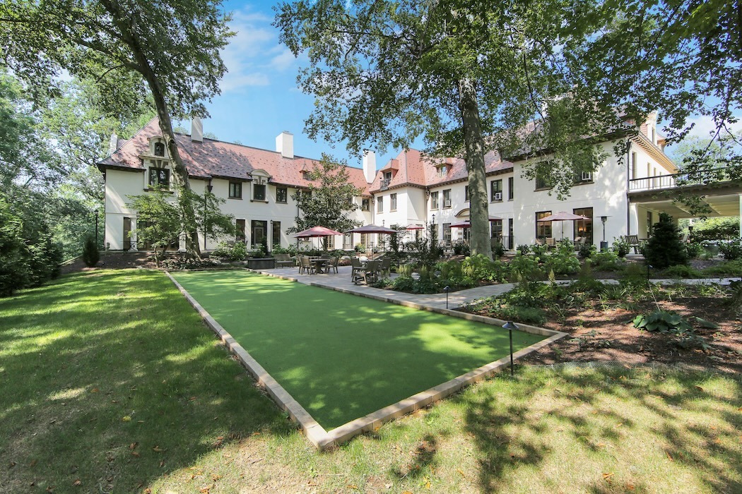 Another view of The Mansion at Rosemont's backyard patio and a putting green