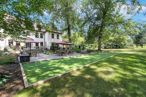 The Mansion at Rosemont backyard patio and a putting green