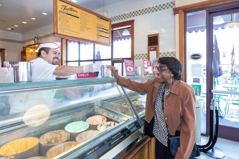 woman sampling ice cream 