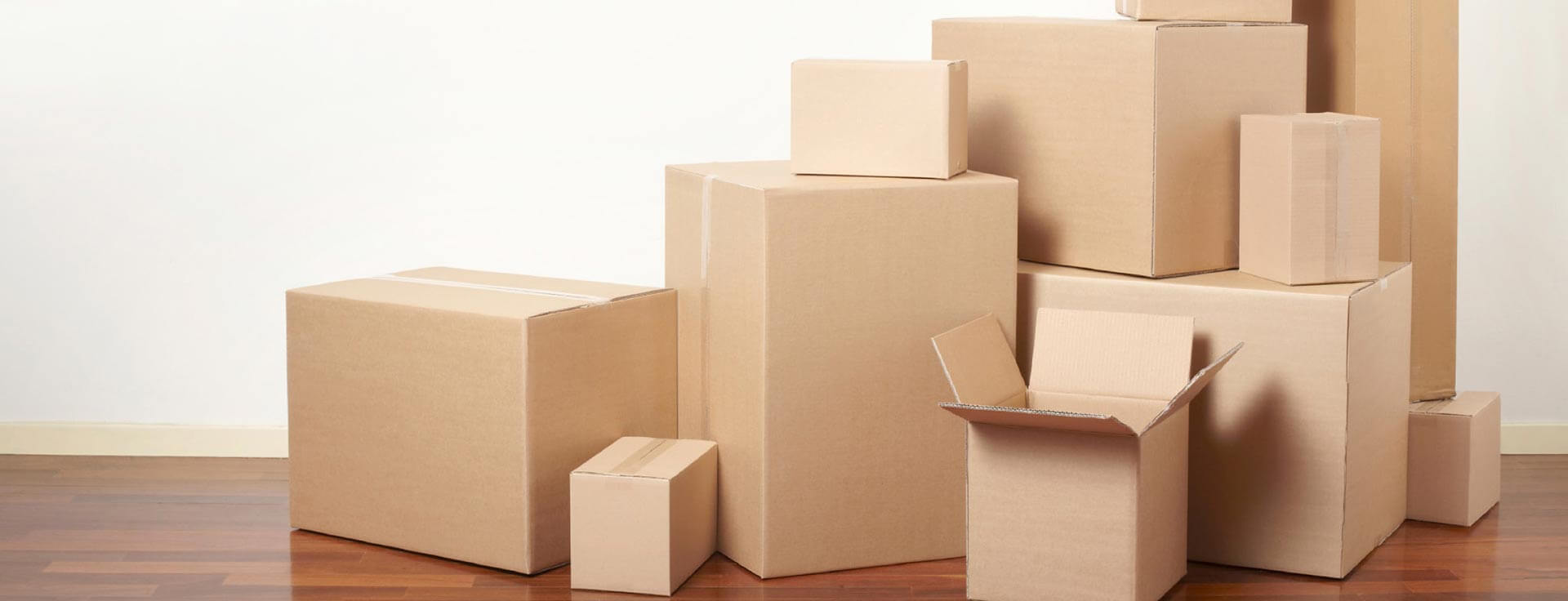 a stack of cardboard moving boxes