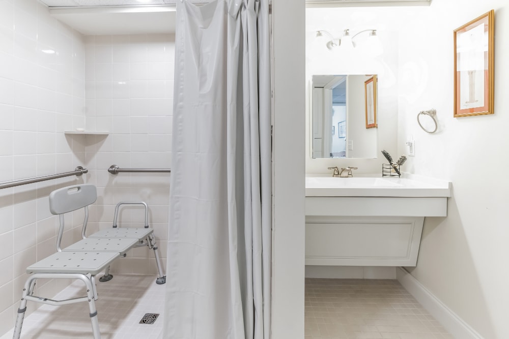 Bathroom with sink and step-in shower