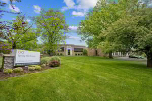Exterior of Spring Mill Pointe building and sign