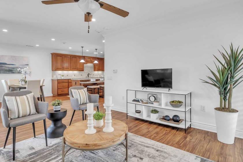 Living room with kitchen in background
