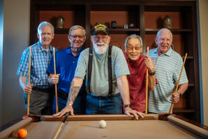 Men playing pool