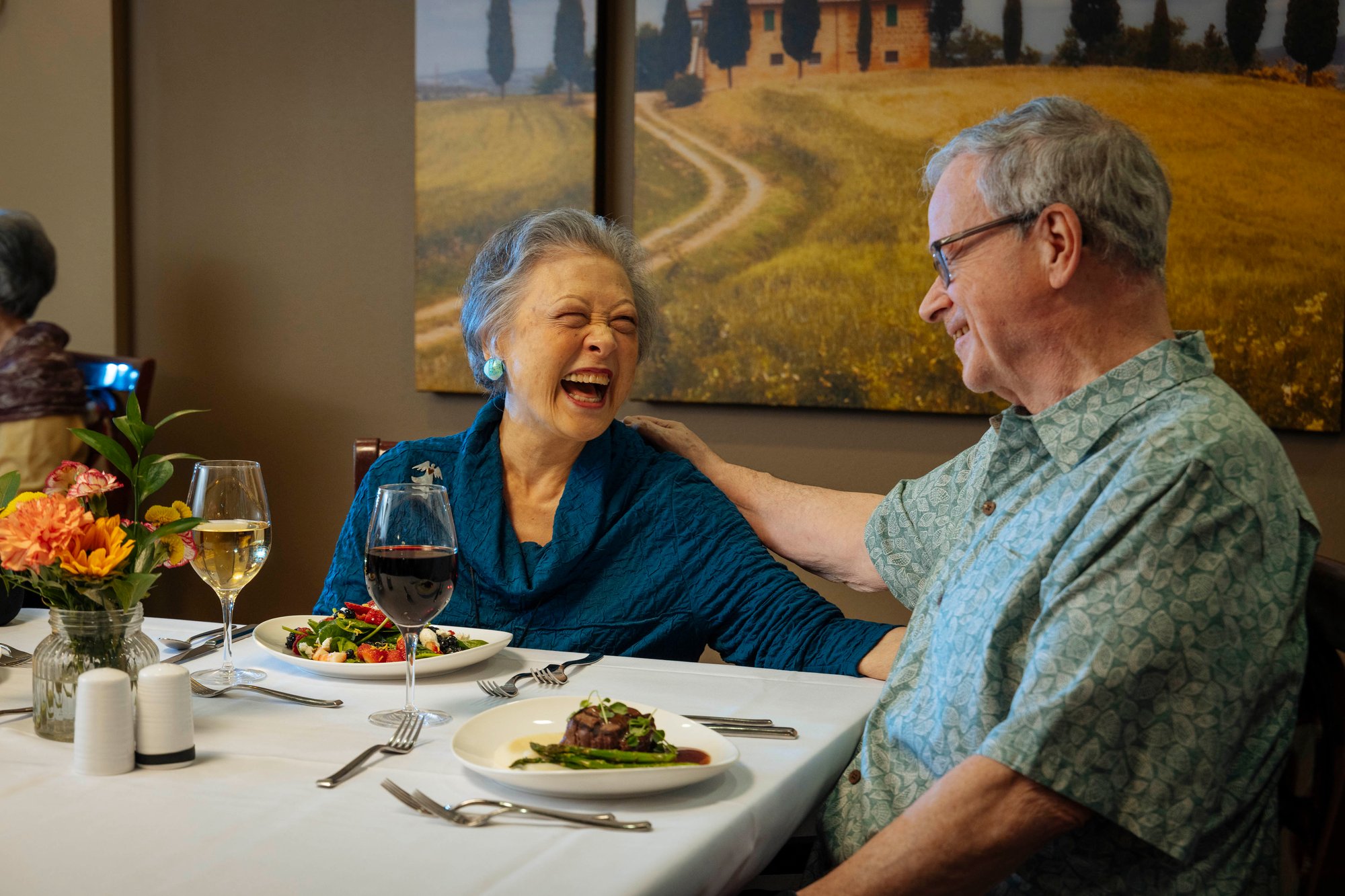 Couple enjoying dinner.