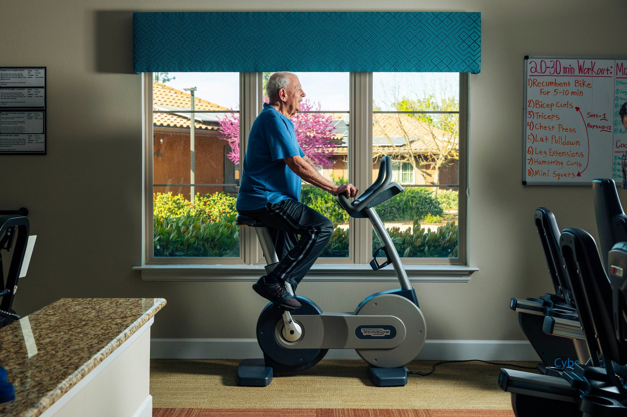 Man using a exercise bike.