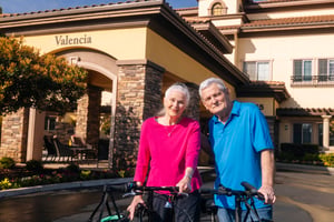 Couple at portico with bikes