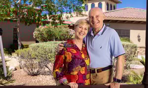senior couple outside smiling