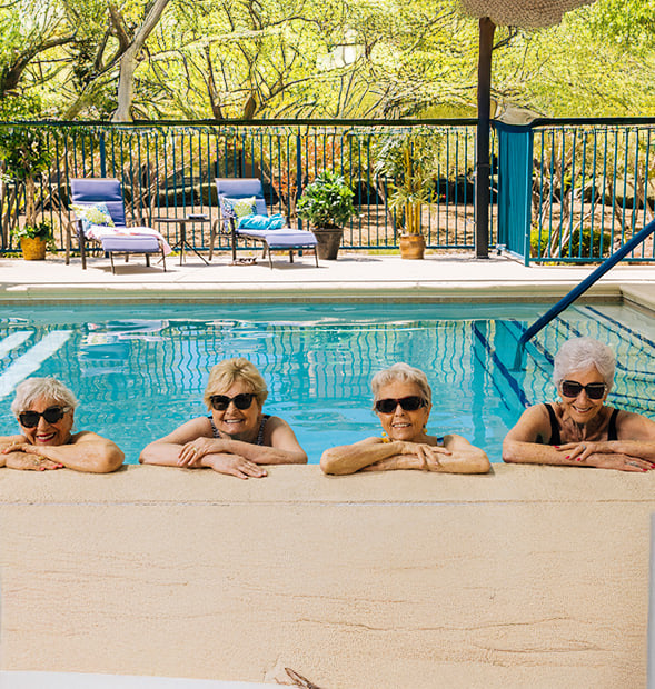 Four senior women in the pool at Las Ventanas at Summerlin