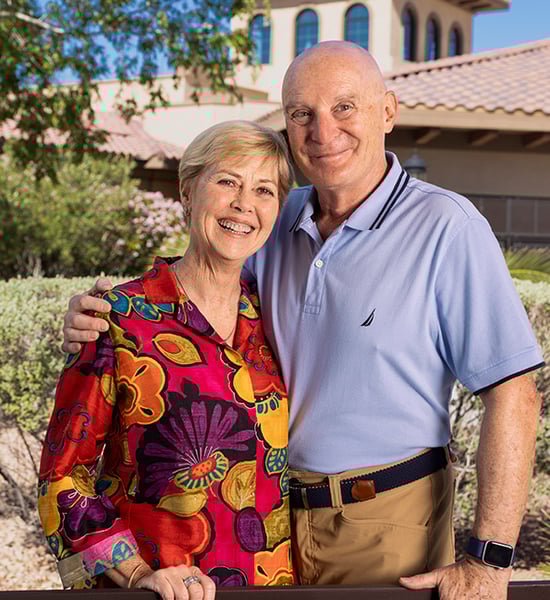 Kevin and Kim outside smiling