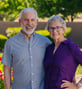 Brent and Karen smiling outside