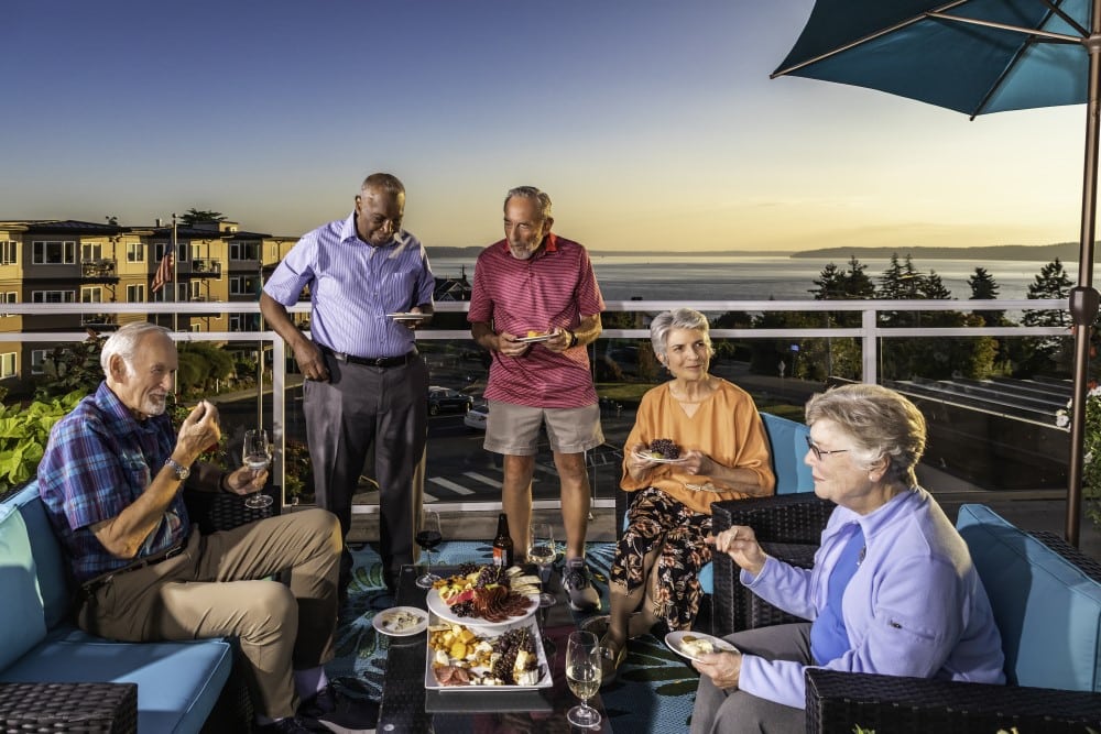 Judson Park residents mingling on rooftop