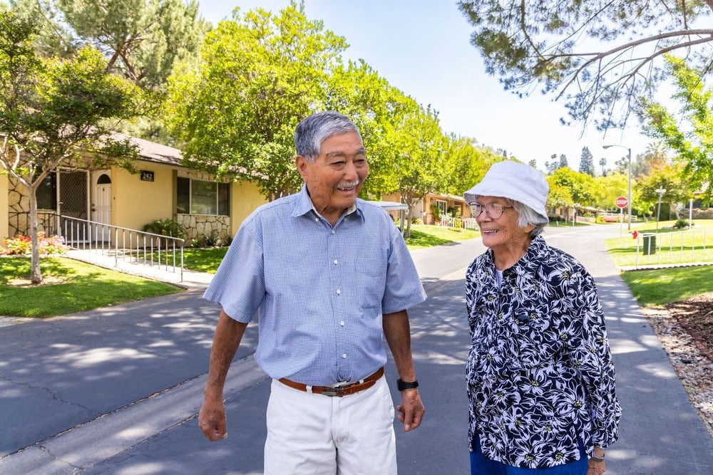 Man and woman walking in street