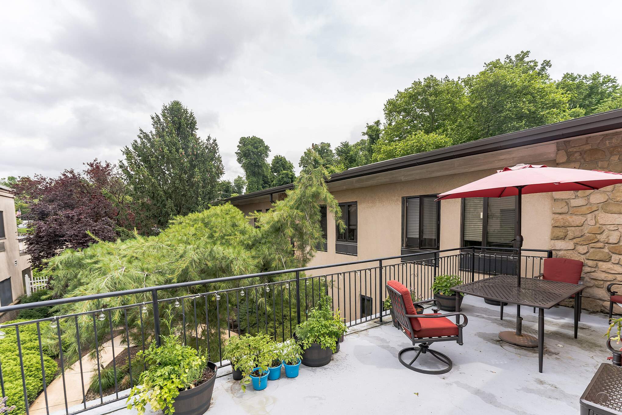 Patio with orange umbrella 