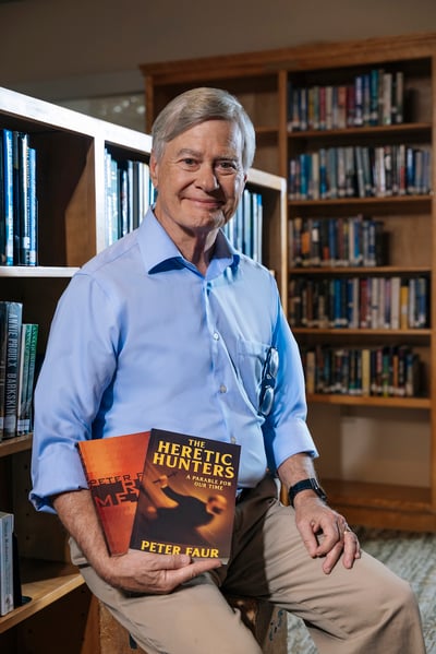 Peter holding his book