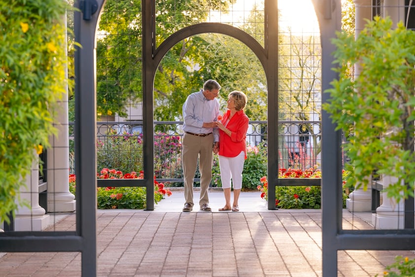 couple standing under patio