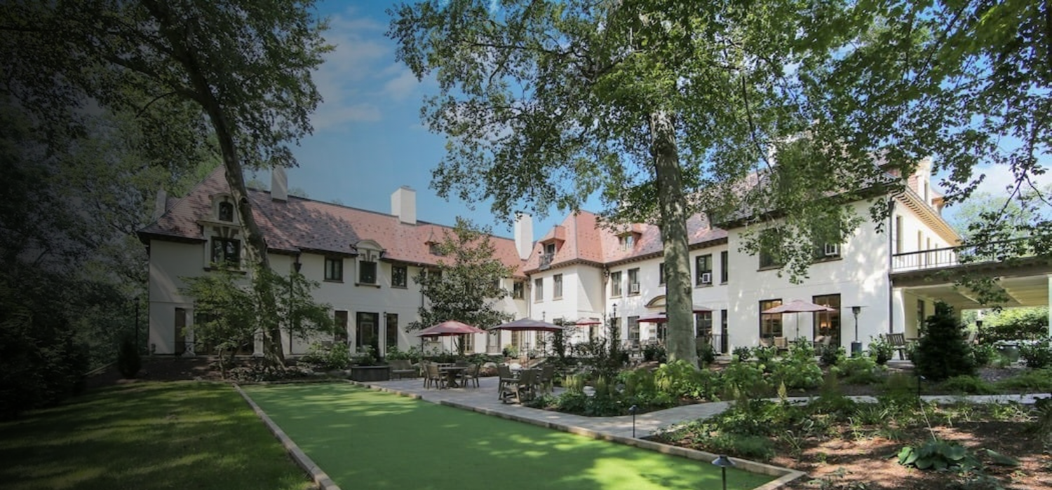 Another view of The Mansion at Rosemont's backyard patio and a putting green