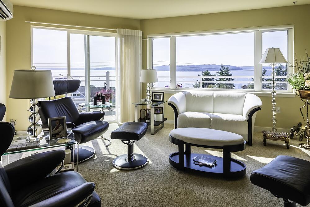 Apartment interior with a balcony overlooking the water