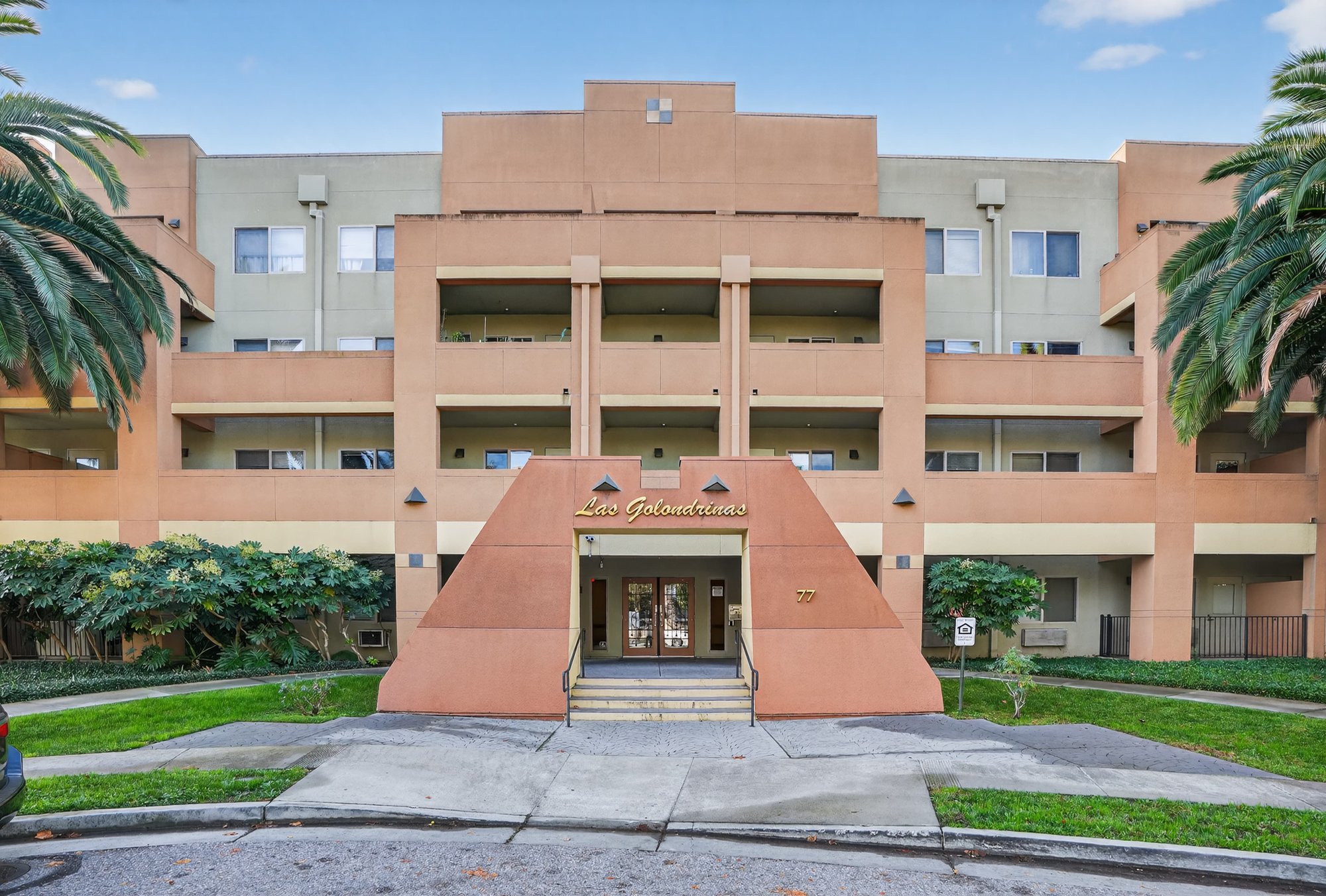 Las Golondrinas affordable community exterior entrance photo.