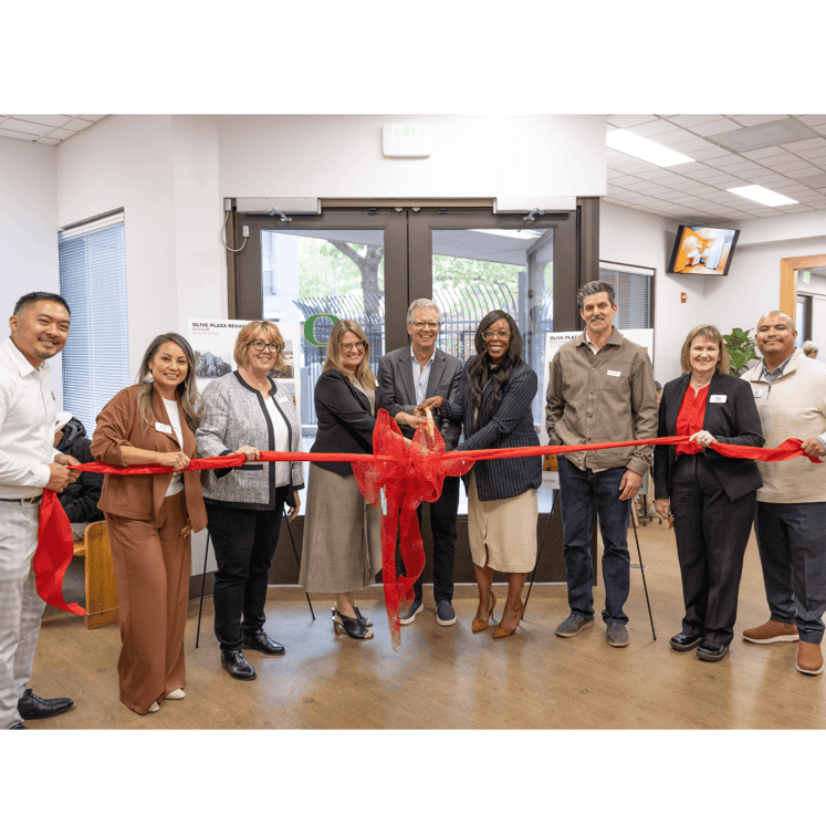 Ribbon cutting at Olive Plaza