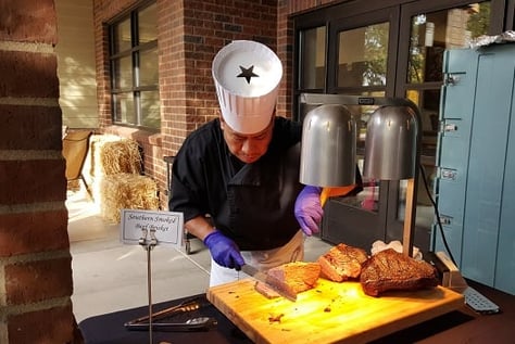 Chef carving meat