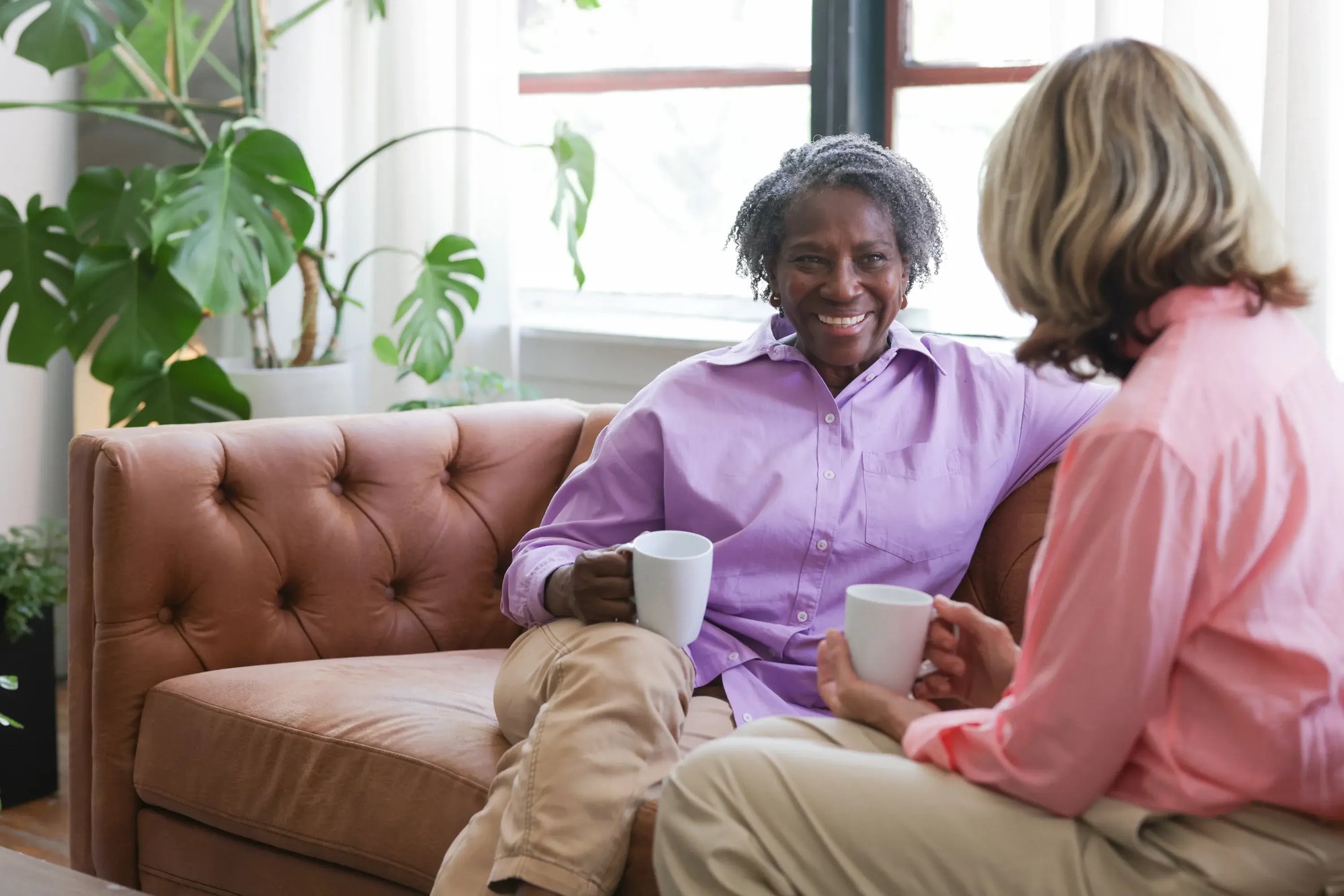 Residents talking while drinking coffee