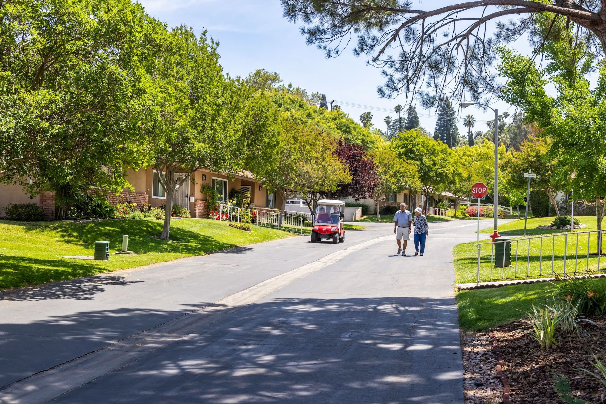 Street with 2 people walking in distance
