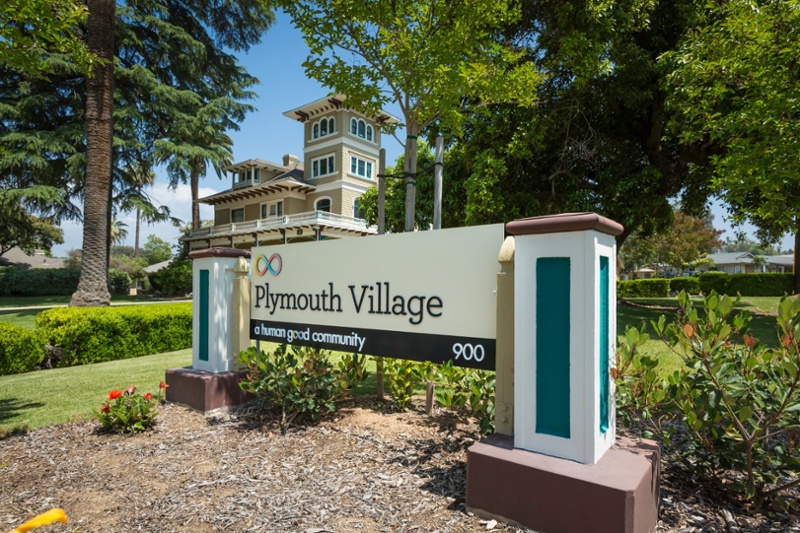 Sign that reads Plymouth Village
