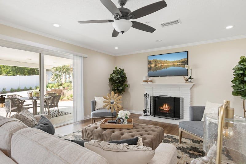 Living area with a television and fireplace
