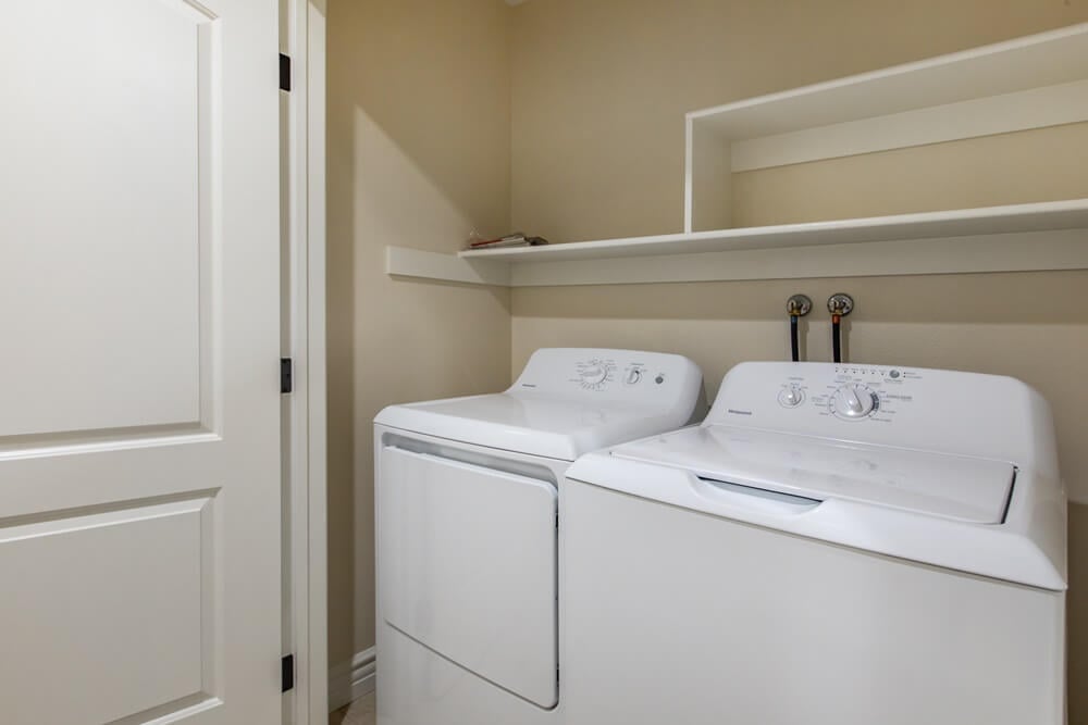 Washer and dryer in a laundry room