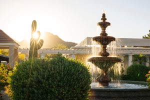 outdoor water fountain with mountain views