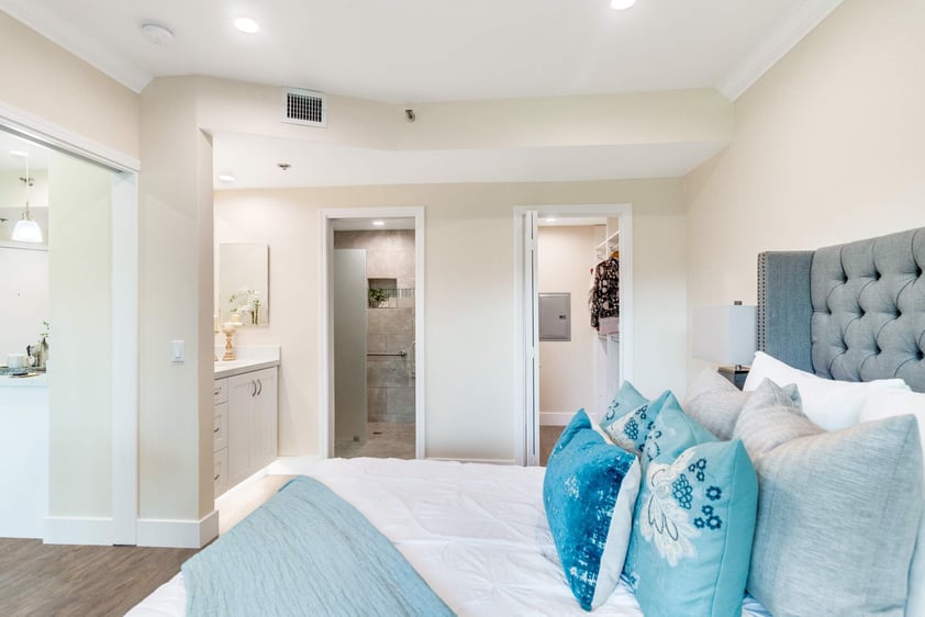 Primary bedroom inside a Regents Point apartment home