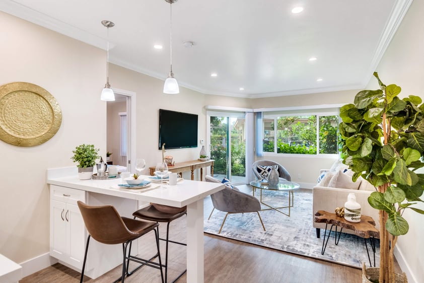 Dining nook and living room inside a Regents Point apartment home