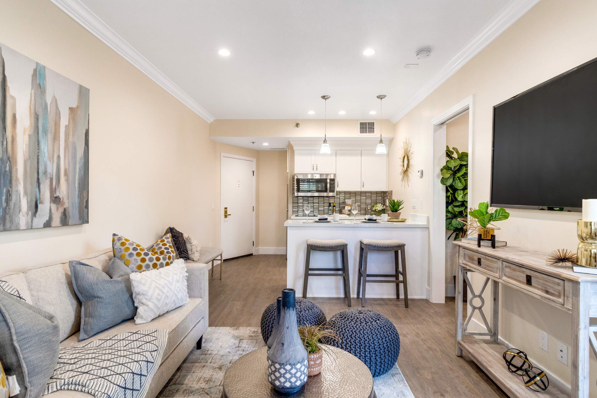 Living room and kitchen inside Regents Point apartment