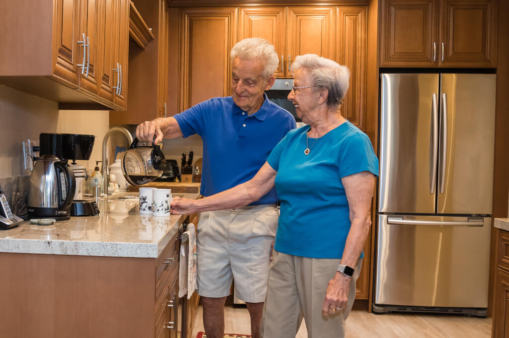 residents making coffee in kitchen