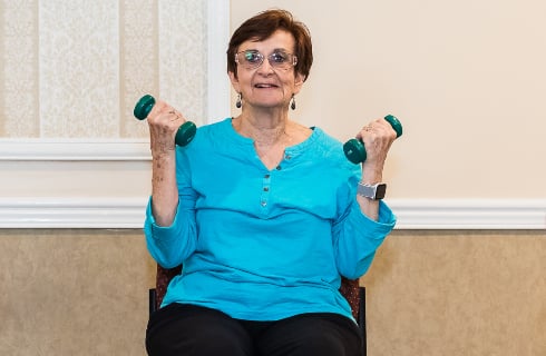 senior living resident participating in exercise classes