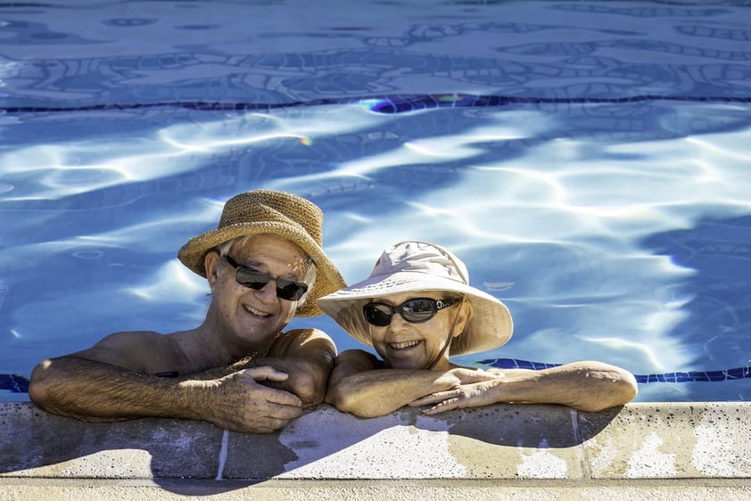 A couple enjoying the pool