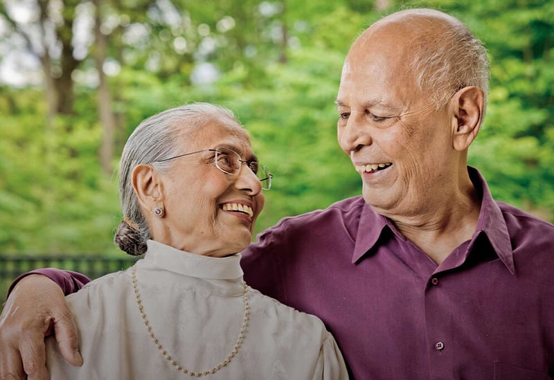 Drs. Haren and Pratima smiling at each other