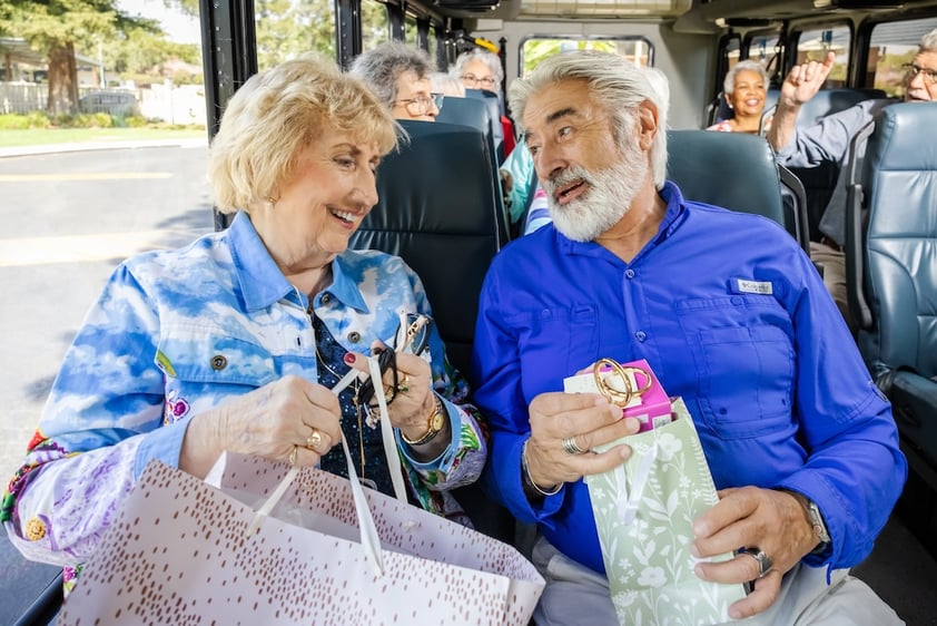 Residents talking inside the bus