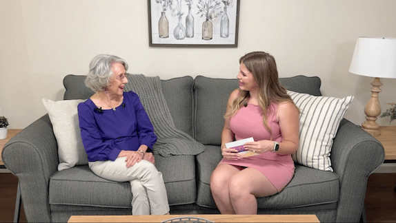 Still from the video featuring Donna, a Rosewood resident, and Rochelle, the executive director, sitting on a couch