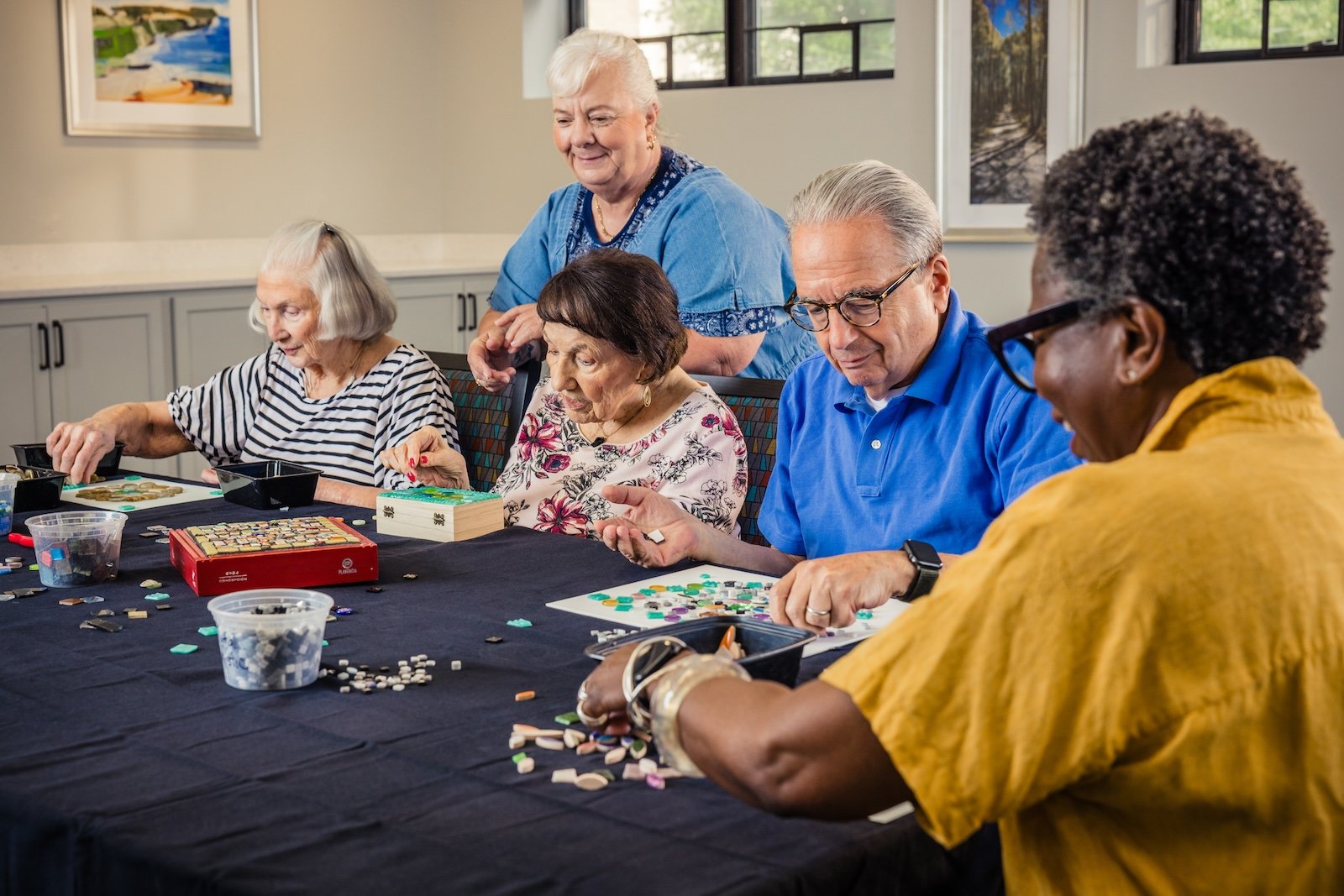 Spring Mill Pointe residents playing board games
