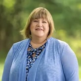 Headshot of Beth Slater-Plechner, sales director