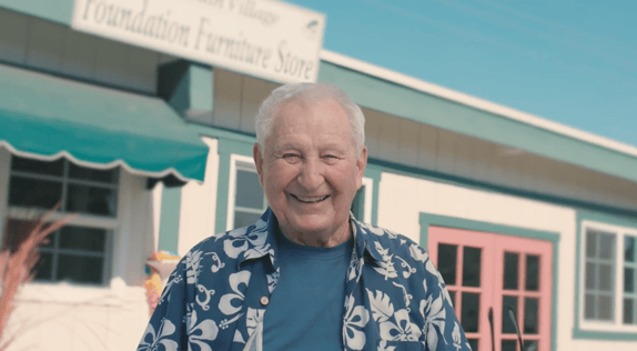 Furniture Store Volunteer smiling outside of the store