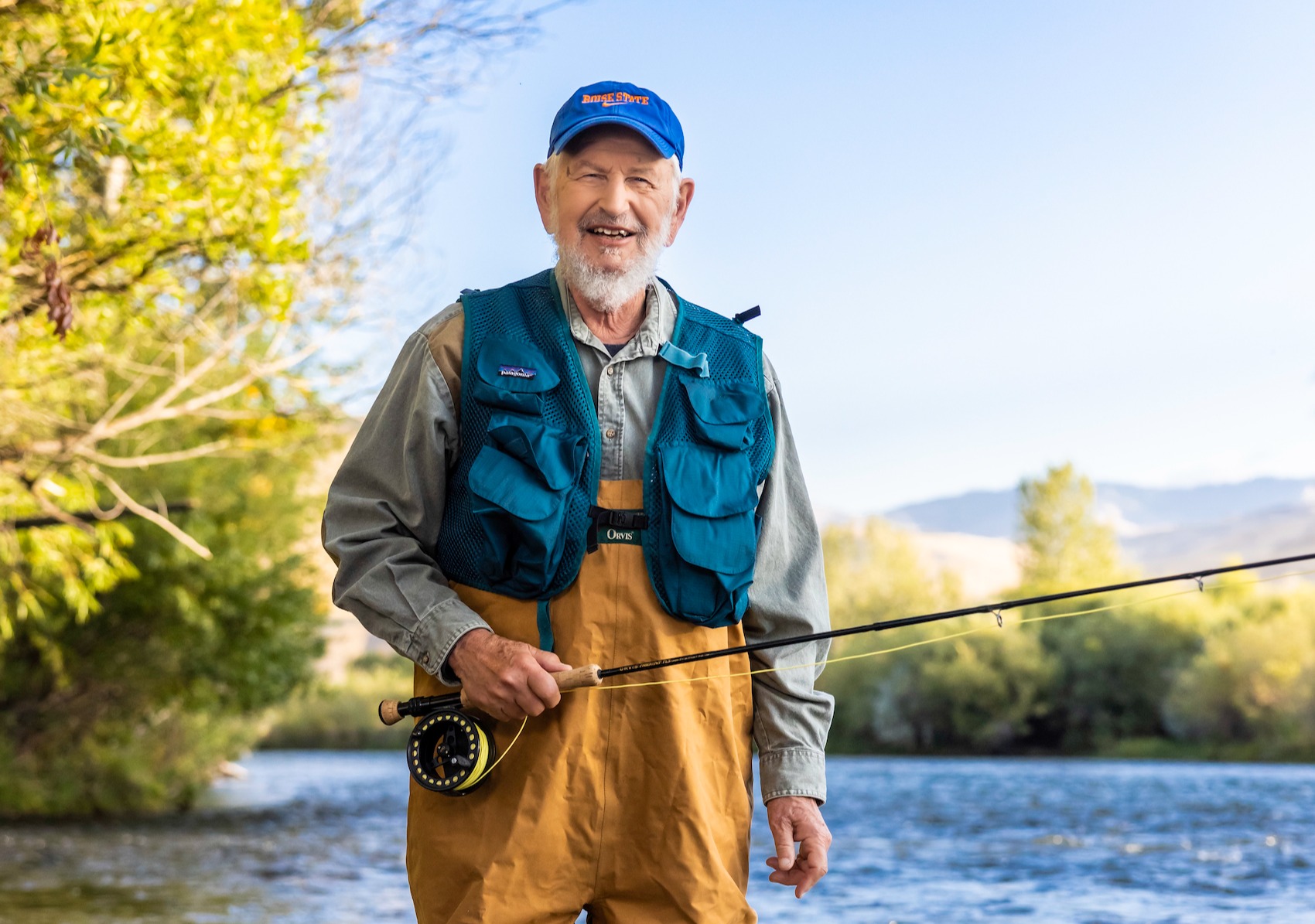 Man going fishing in a stream