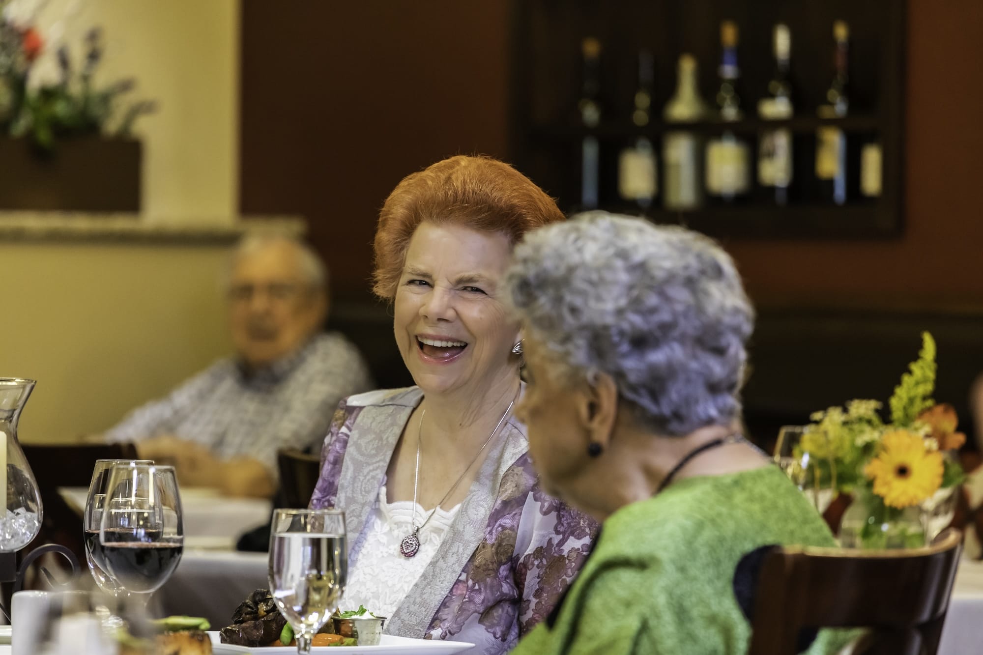 Two residents having dinner in a restaurant