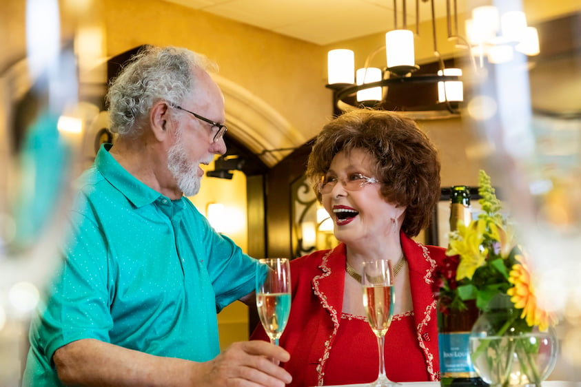 seniors enjoying wine at an event