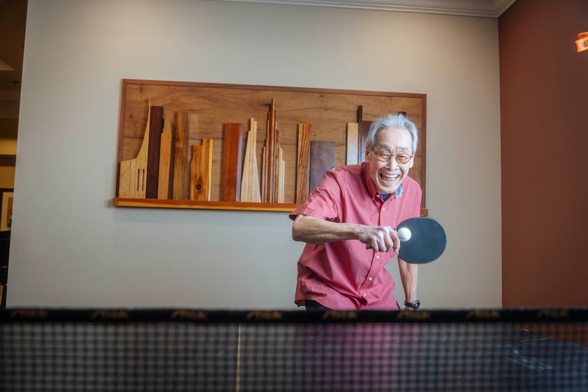 A man playing ping pong