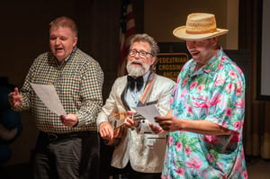 Three men putting on a show
