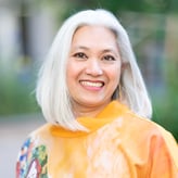 Headshot of Zinnia Miravalles Koch