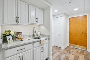 Kitchen view with brown door